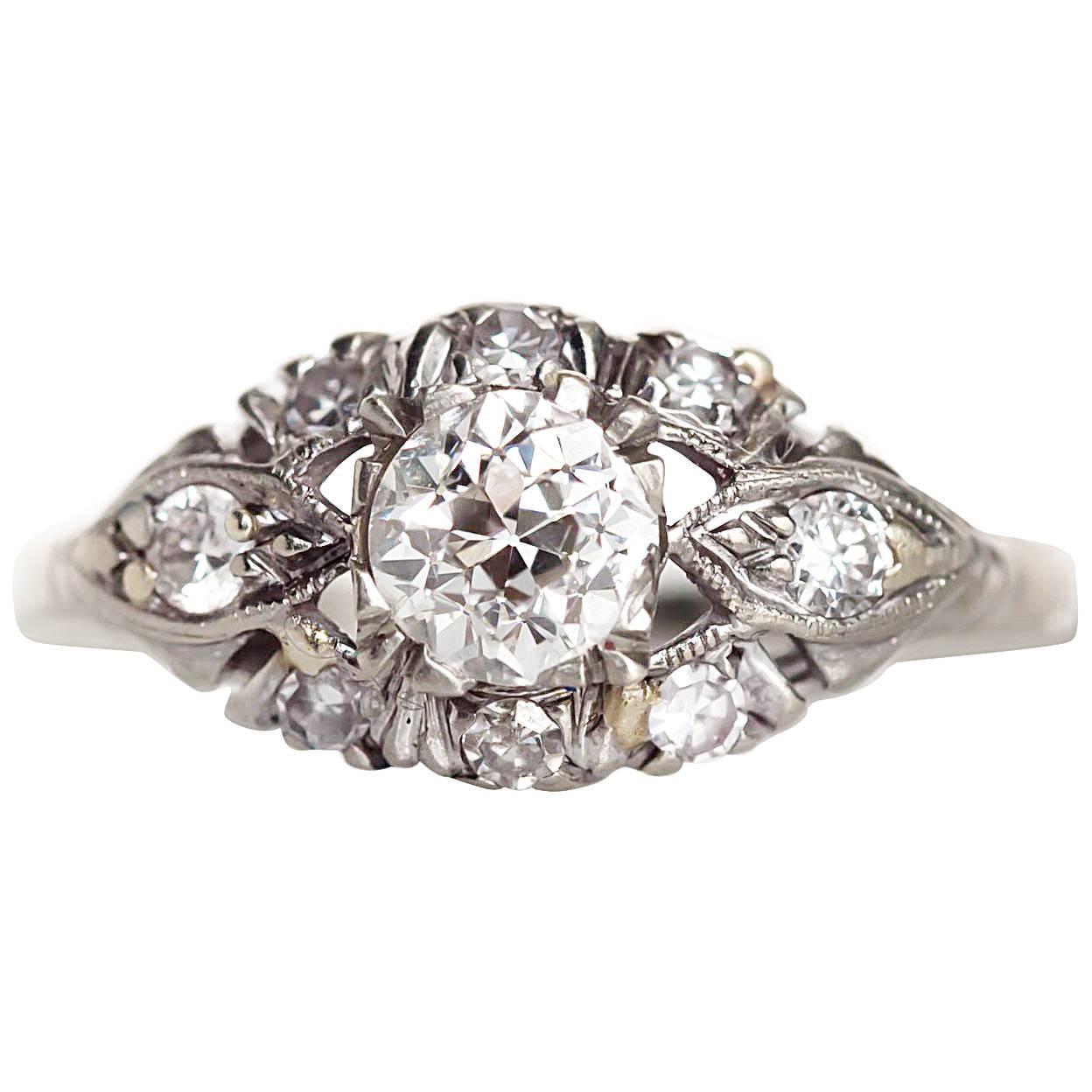 1920s Art Deco Platinum GIA Certified .53 Carat Diamond Engagement Ring For Sale