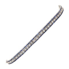 Bracelet tennis en platine avec diamants et saphirs de 7,5 carats, 1920