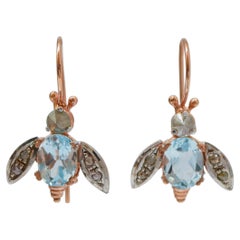 Aquamarine Colour Topaz, Diamonds, Rose Gold and Silver Fly Earrings.
