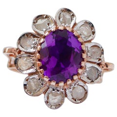 Anello floreale in ametista, diamanti, oro rosa e argento.