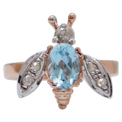 Aquamarine Colour Topaz, Diamonds, Rose Gold and Silver Fly Ring.