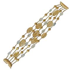 Marco Bicego  Pièce d'or caractéristique  Bracelet de pierres multibrins