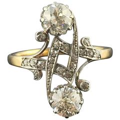 Antique "You and Me" Art Nouveau Ring in 18 kt Gold with 2 Diamonds of 0.6 ct I/VS