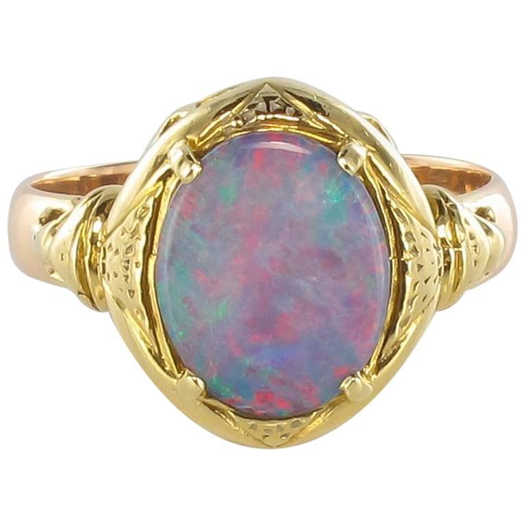 1900s Opal and 18 Carat Yellow Gold Ring