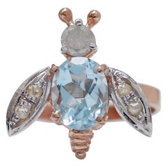 Aquamarine Colour Topaz, Diamonds, Rose Gold and Silver Fly Ring.