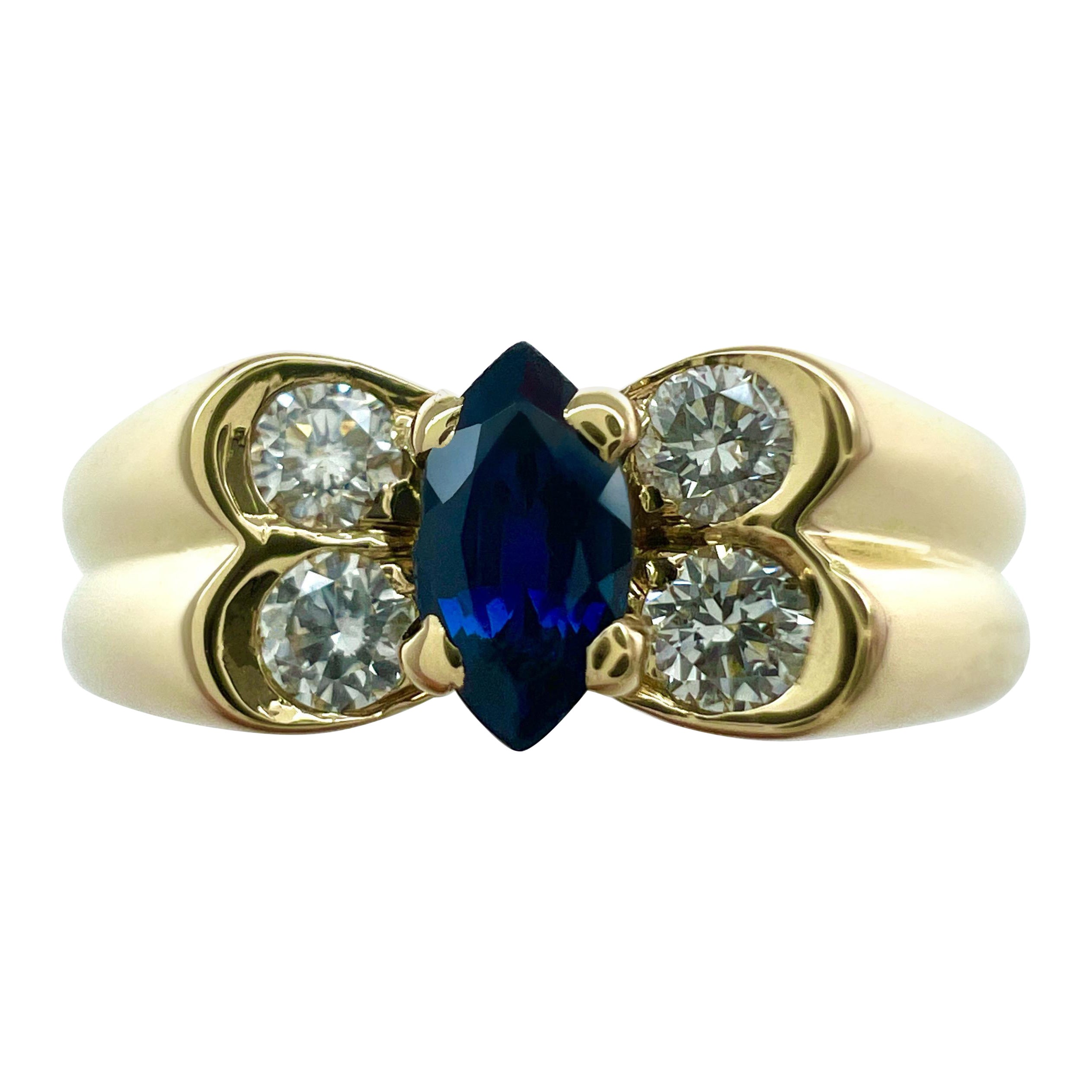 Anillo marquise vintage Van Cleef & Arpels de zafiro azul profundo y diamantes en forma de mariposa