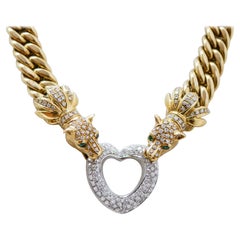 Collana con smeraldi, diamanti, oro giallo 18 carati e oro bianco.