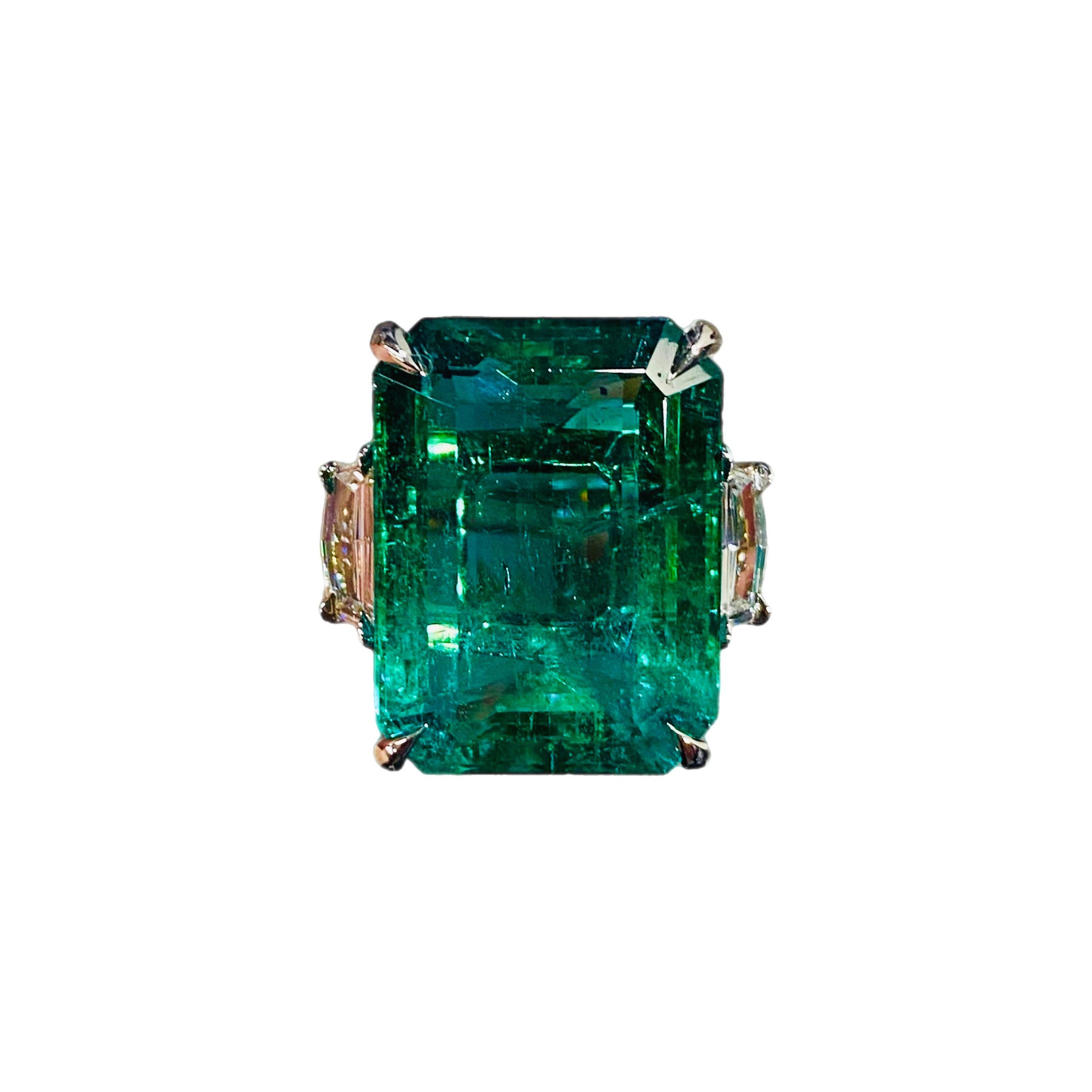 This remarkable 16.73-carat emerald is a true masterpiece of nature, showcasing a captivating deep green hue that exudes elegance and luxury. With its exceptional clarity and vibrant color saturation, this gemstone is an extraordinary example of