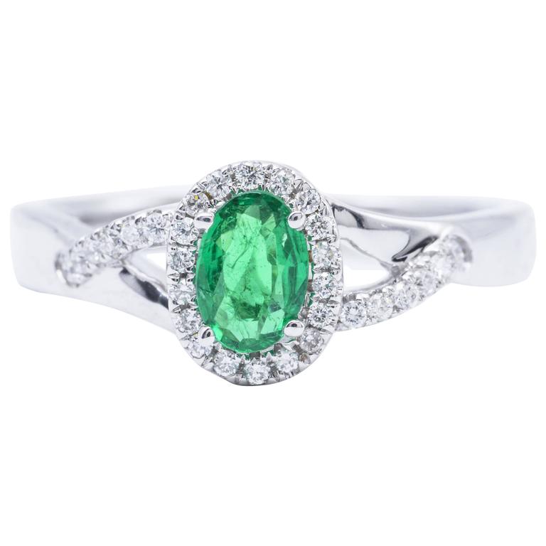 Emerald and Diamond Halo  Engagement  Ring  For Sale  at 1stdibs