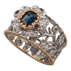 Anello a fascia in oro giallo con diamante bianco taglio smeraldo e zaffiro blu in stile Art Deco