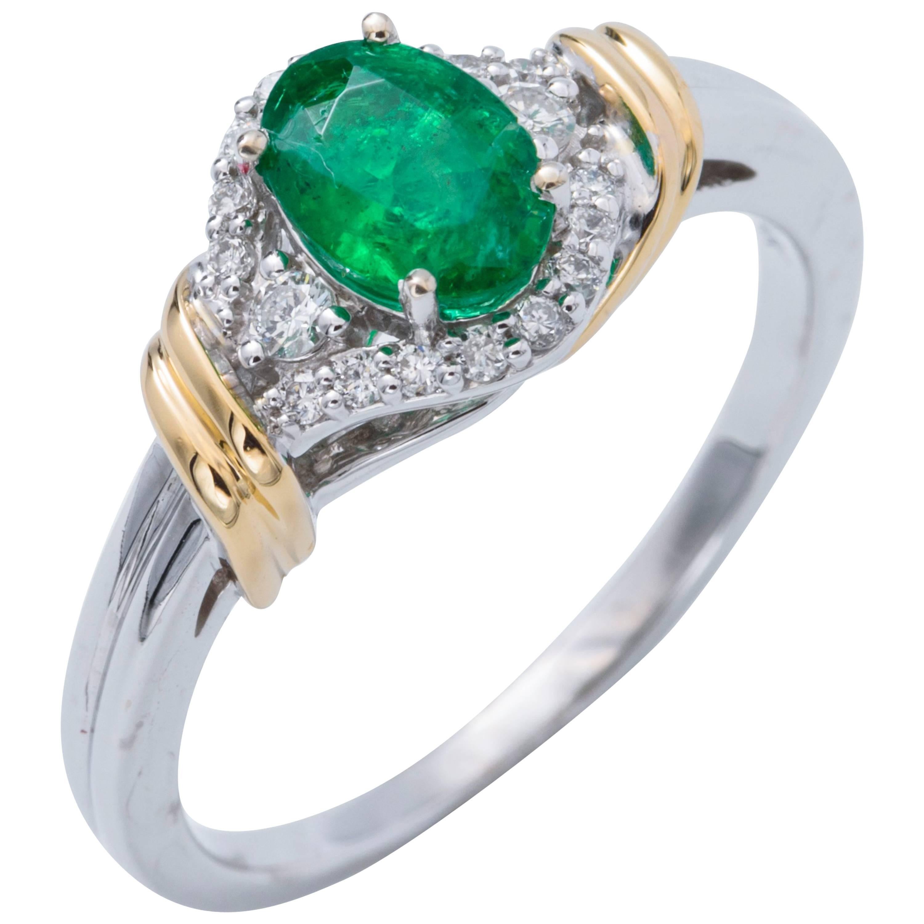 Two-Tone Oval Shape Emerald and Diamond Halo Ring