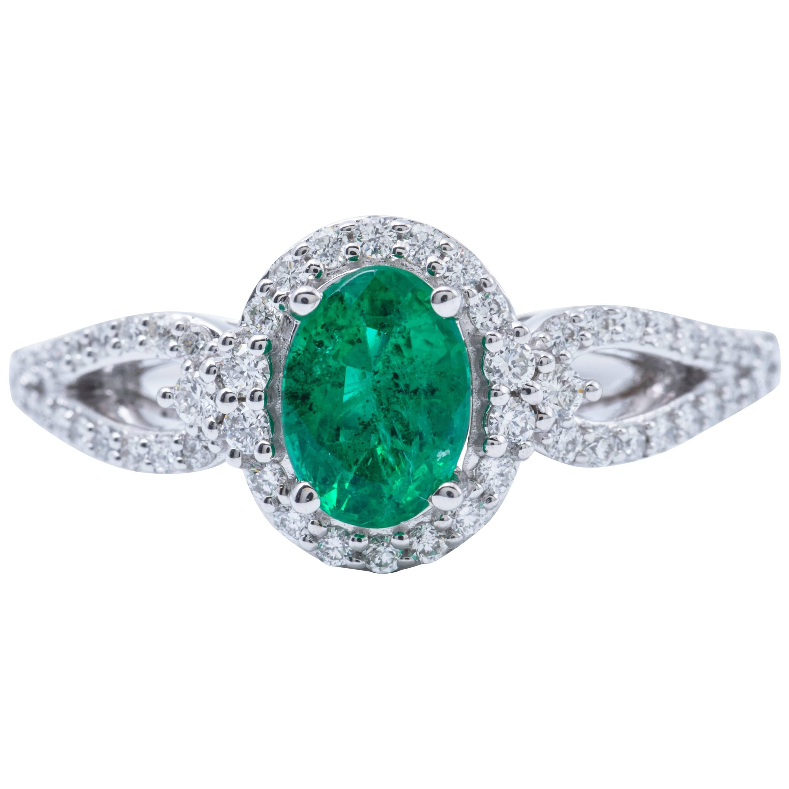 Oval Shape Emerald and Diamond Halo Engagment Cocktail Ring