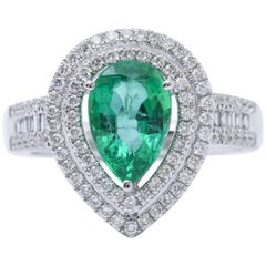 Cocktail-Verlobungsring in Birnenform mit Smaragd und Diamant in Gold mit Halo