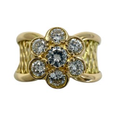 Van Cleef & Arpels, rare bague vintage filigrane fleur en or jaune 18 carats avec diamants