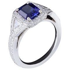 Platinum Emerald Cut Sapphire and Diamond Ring