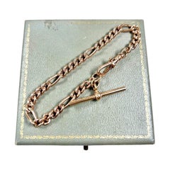 Bracelet Figaro 1957 poinçonné en or rose 9 carats avec barre en T et fermoir pivotant