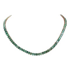Exquisite Smaragd-Halskette aus 14 Karat massivem Gelbgold