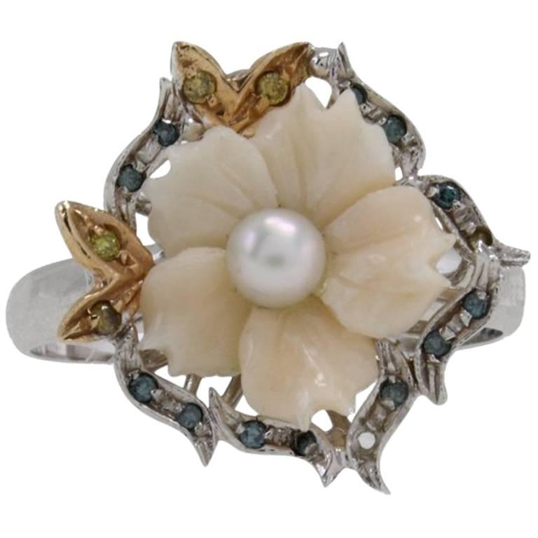 shipping policy: 
No additional costs will be added to this order.
Shipping costs will be totally covered by the seller (customs duties included). 
 
Cocktail ring in 14kt white yellow gold mounted with flower shaped coral, south sea pearl in the