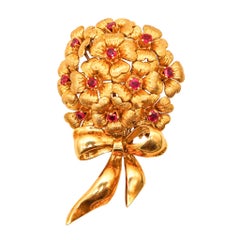 TIFFANY & CO. Spilla Bouquet 1950 in oro giallo 18Kt con rubini rossi vivi