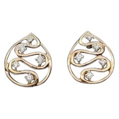 Pendiente de oro macizo de 14k con diamante natural