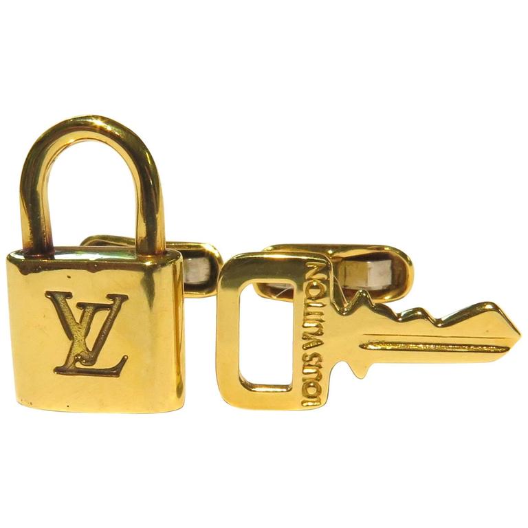Louis Vuitton Gold Lock and Key Cufflinks For Sale at 1stdibs