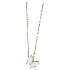 Van Cleef & Arpels Pendentif deux papillons en nacre et or rose 18 carats