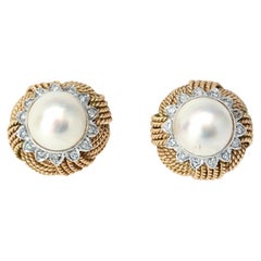 Pendientes de perlas rodeadas de diamantes