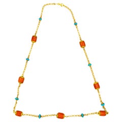 Collana in stile Art Nouveau realizzata a mano con corallo pesca e turchese in oro giallo