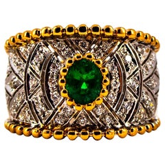 Anillo de cóctel de oro amarillo estilo art déco con esmeralda de 0,60 quilates y diamante de 0,50 quilates