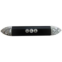 Antique Art Deco Diamond Onyx White Gold and Platinum Brooch, circa 1920