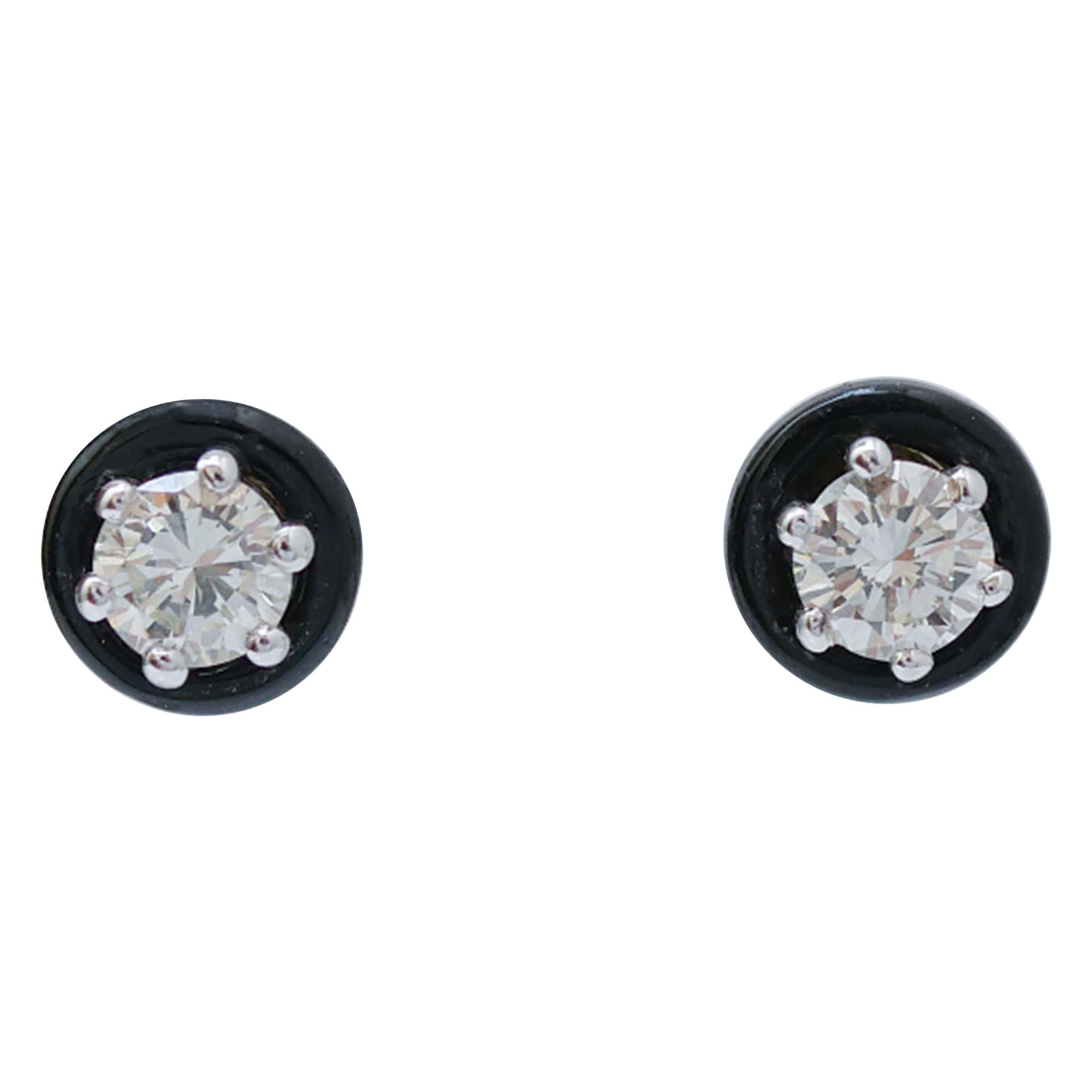 Diamonds, Onyx, 14 Karat White Gold Earrings.
