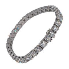 Bracelet tennis en or blanc 14 carats avec diamants totalisant 16,20 de couleur G-H et de pureté SI