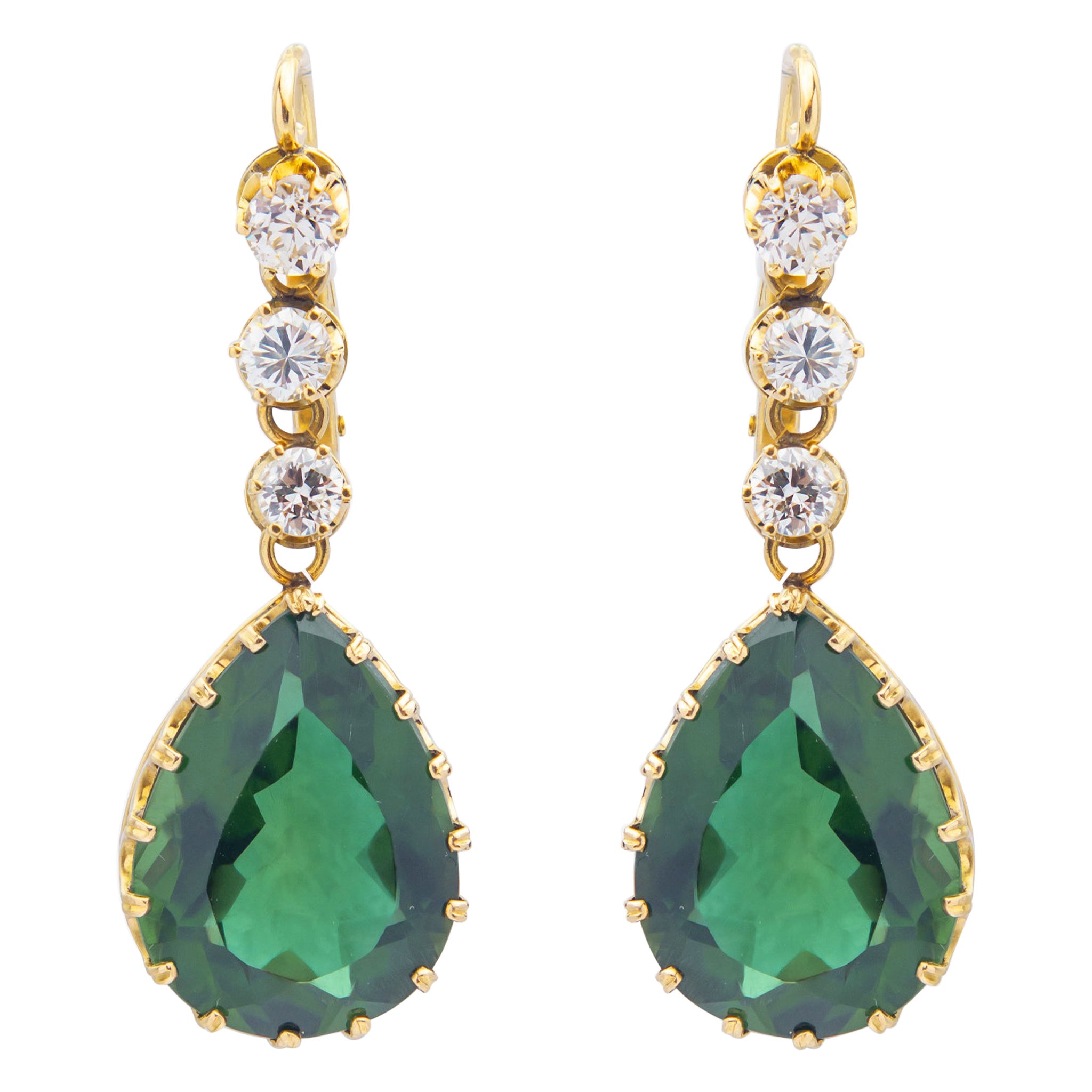 Boucles d'oreilles en or jaune 18 carats serties de diamants en vente