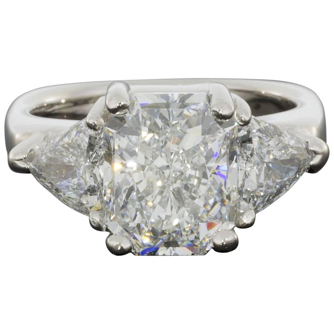 Magnificent Colorless Radiant and Triangle GIA Certified Diamond Engagement Ring For Sale