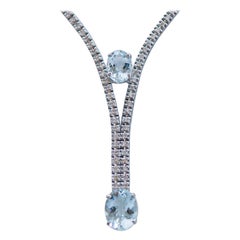 Aquamarine, Diamonds, 14 Karat White Gold Tennis Necklace.