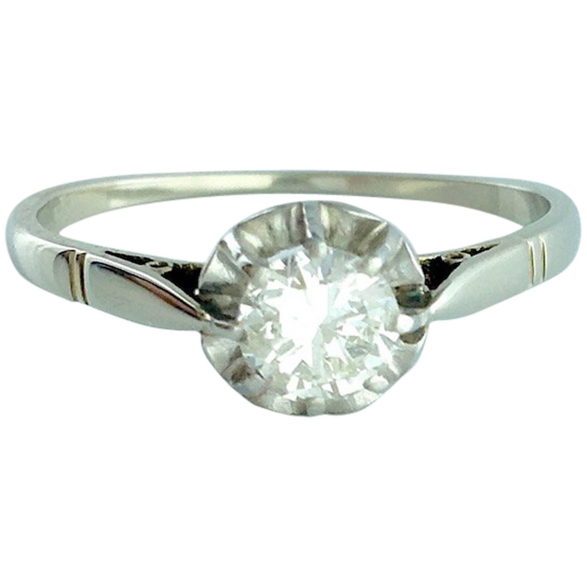 0.43 carat Round cut Diamond centering a platinum Solitaire ring.
Circa 1900.
French marks.

Gross weight: 1.75 grams.