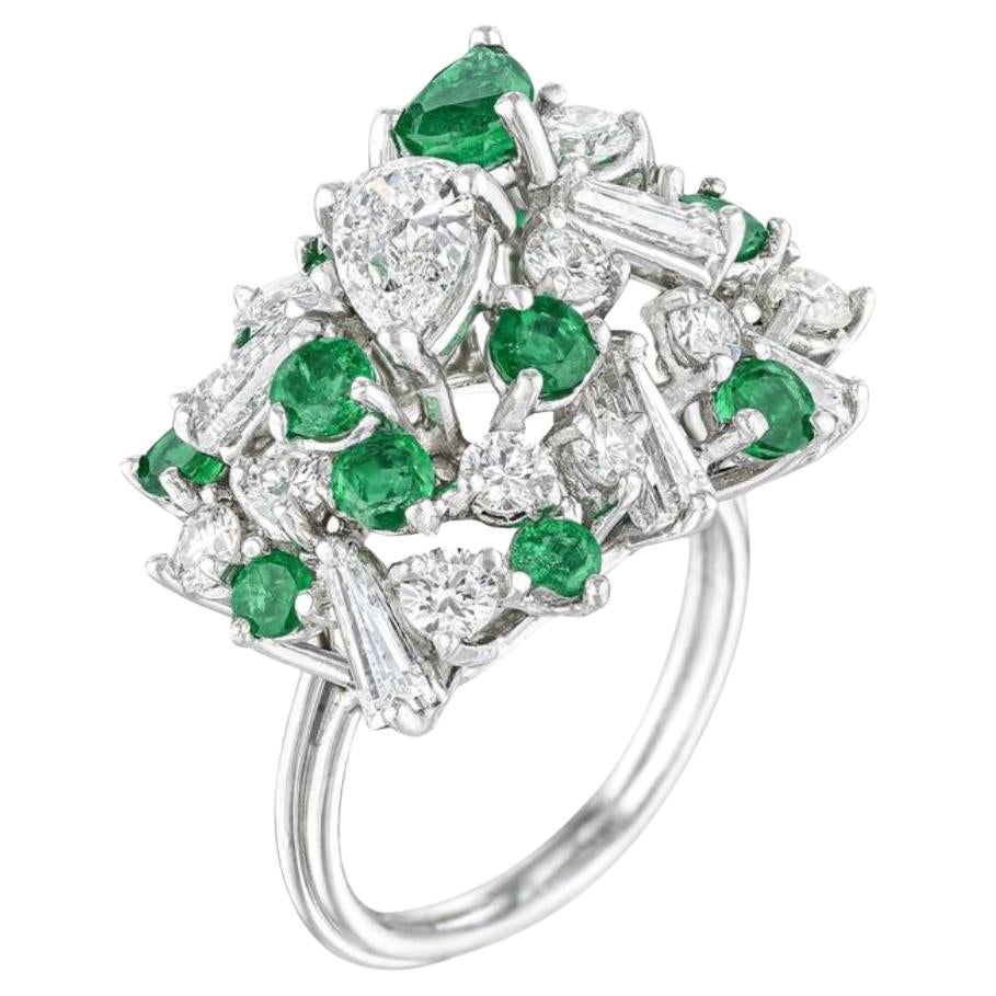 Emerald and Diamond Cluster Ring in 18k White Gold.