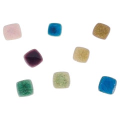 Ole Bjørn Krüger. Eight unique brooches in glazed stoneware in various shades.