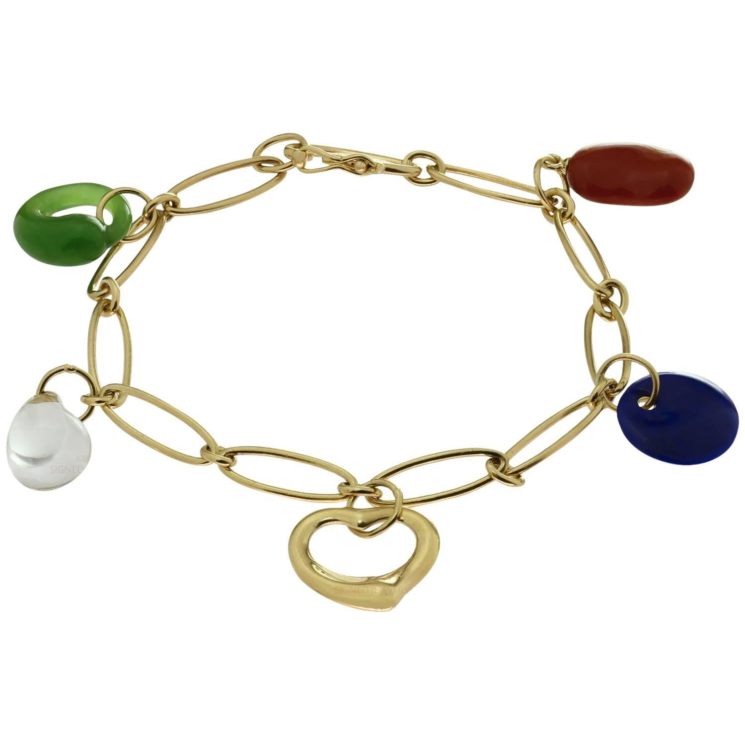 Tiffany 
Co. Elsa Peretti Cat Island Beach Shell Yellow Gold Charm Bracelet