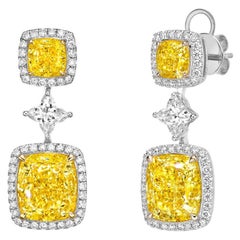 Emilio ! Boucle d'oreille diamant certifié GIA 10.00 carat Fancy Yellow Flawless