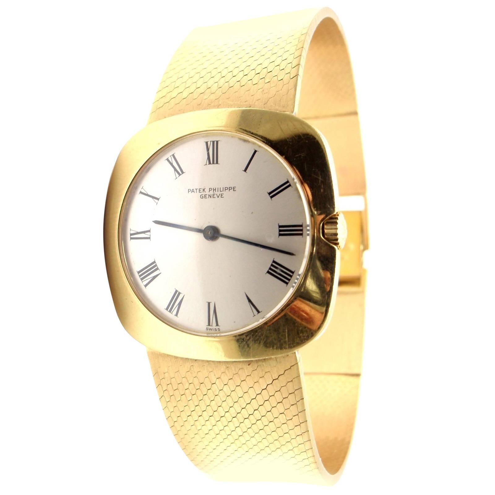 Patek Philippe Yellow Gold Manual Wind Wristwatch with Integral Bracelet Watch