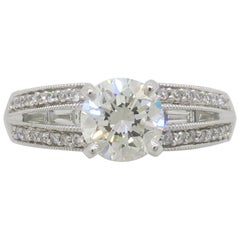 Anello con diamante rotondo e taglio baguette certificato GIA 1.48CTW