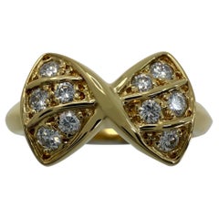 Seltener Vintage Van Cleef & Arpels Gelbgoldring mit Diamant-Kreuzschleife und Diamant-Kreuzschleife