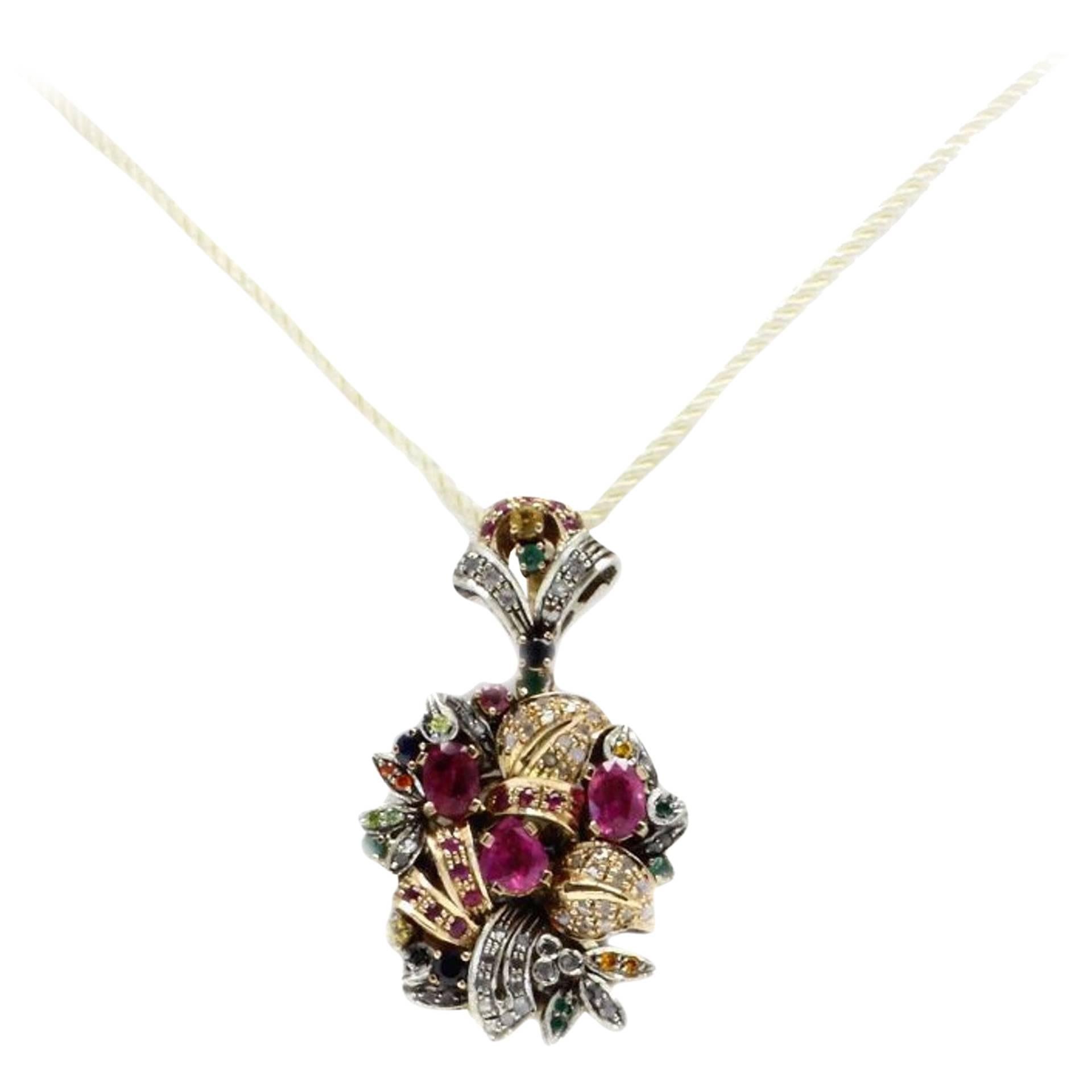 Classic pendand necklace in 9Kt rose gold and silver, adorned with diamonds, emeralds, rubies, blue sapphires and other multicolor hard stones.
Diamonds (0.45 ct )
Emeralds, Rubies,Sapphires(5.61 ct)
Multi color hard stones 0.10 gr
Tot weight 16.3