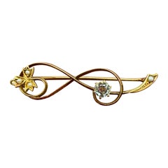 Art Nouveau Aquamarine (0.60ct), Seed Pearl, 15K Rose Gold Floral Motif Brooch
