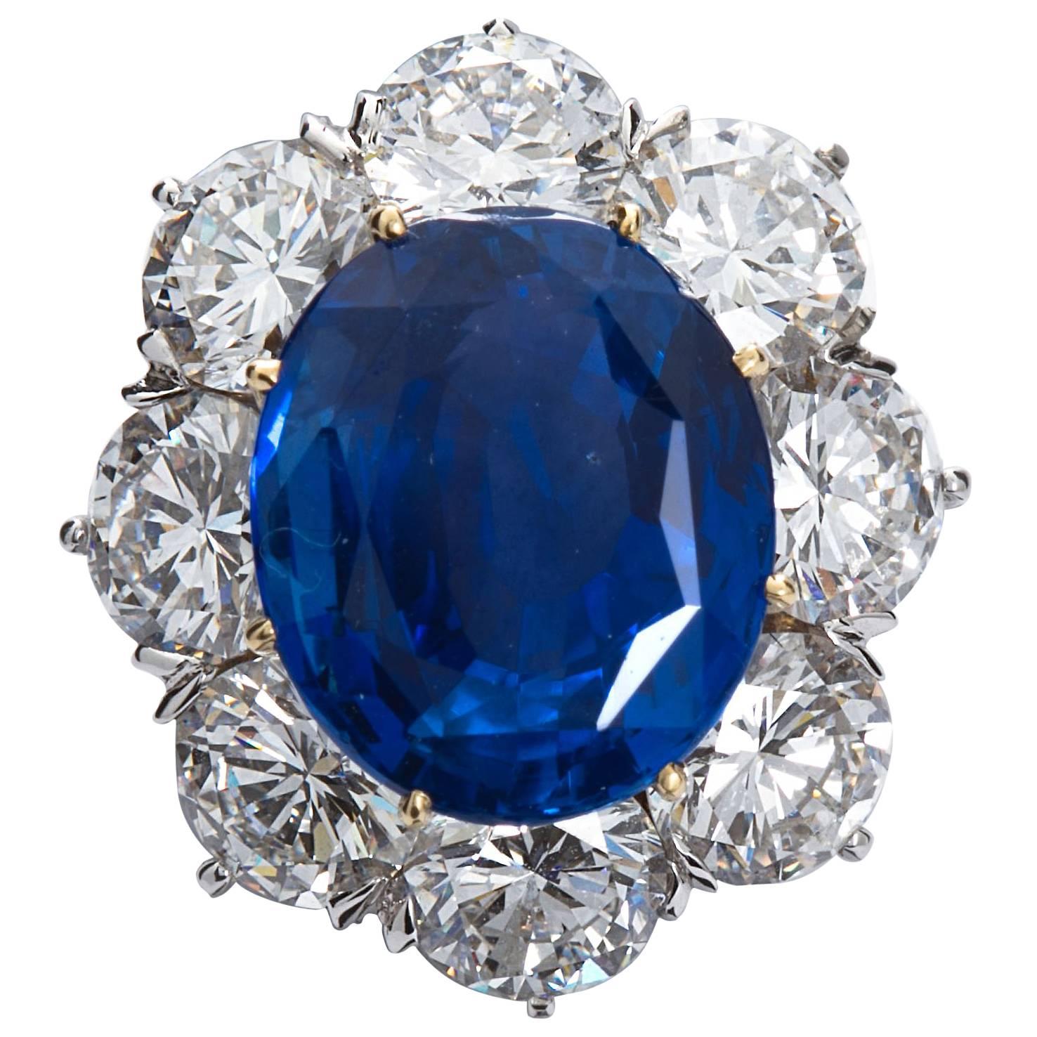 Unheated 7.28 Carat Oval Blue Sapphire Cluster Ring