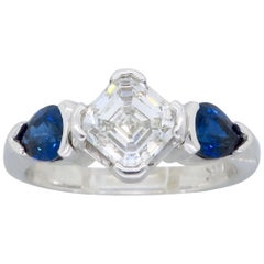 Asscher Cut Diamond and Sapphire Three-Stone Engagement Ring