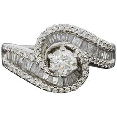 Round and Baguette Diamond White Gold Bypass Engagement Ring
