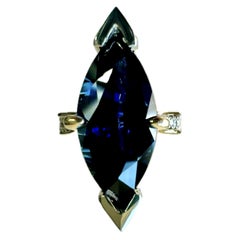 Platinum 18K Yellow Gold GIA Certified 7.56 Carat Marquise Blue Sapphire Ring