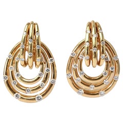 Boucles d'oreilles mixtes Dieu et diamant